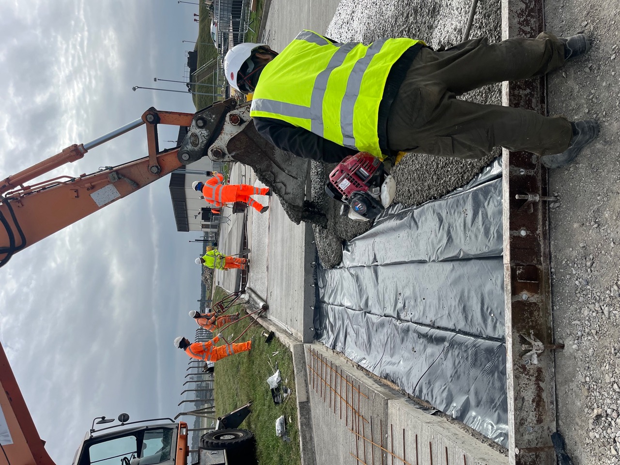 HL Civils operatives placing and finishing concrete at RAF Lakenheath