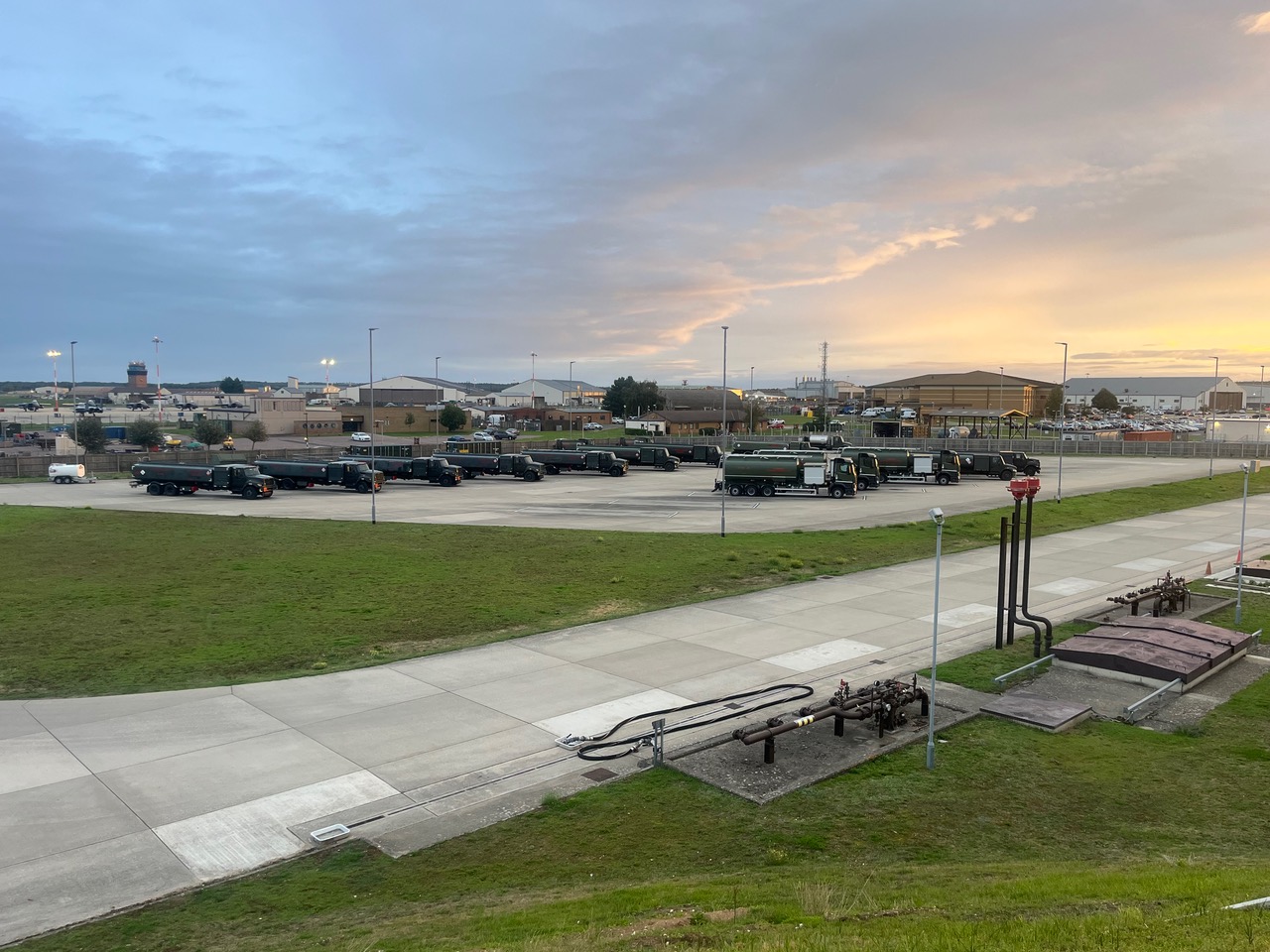 Military fuel tankers parked on the completed hardstanding at dusk at RAF Lakenheath R11 and R12 Yard